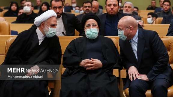 Iran’s President Ebrahim Raisi (center), Parliament Speaker Mohammad-Bagher Ghalibaf (right), and Chief Justice Gholam-Hossein Mohseni-Ejei