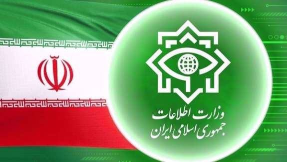 The logo of Iran’s Intelligence Ministry and the national flag of the Islamic Republic