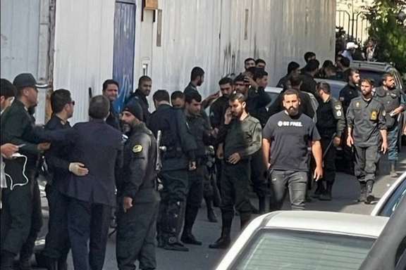 A group of security forces waiting on a side street to confront protesters in a university in Iran