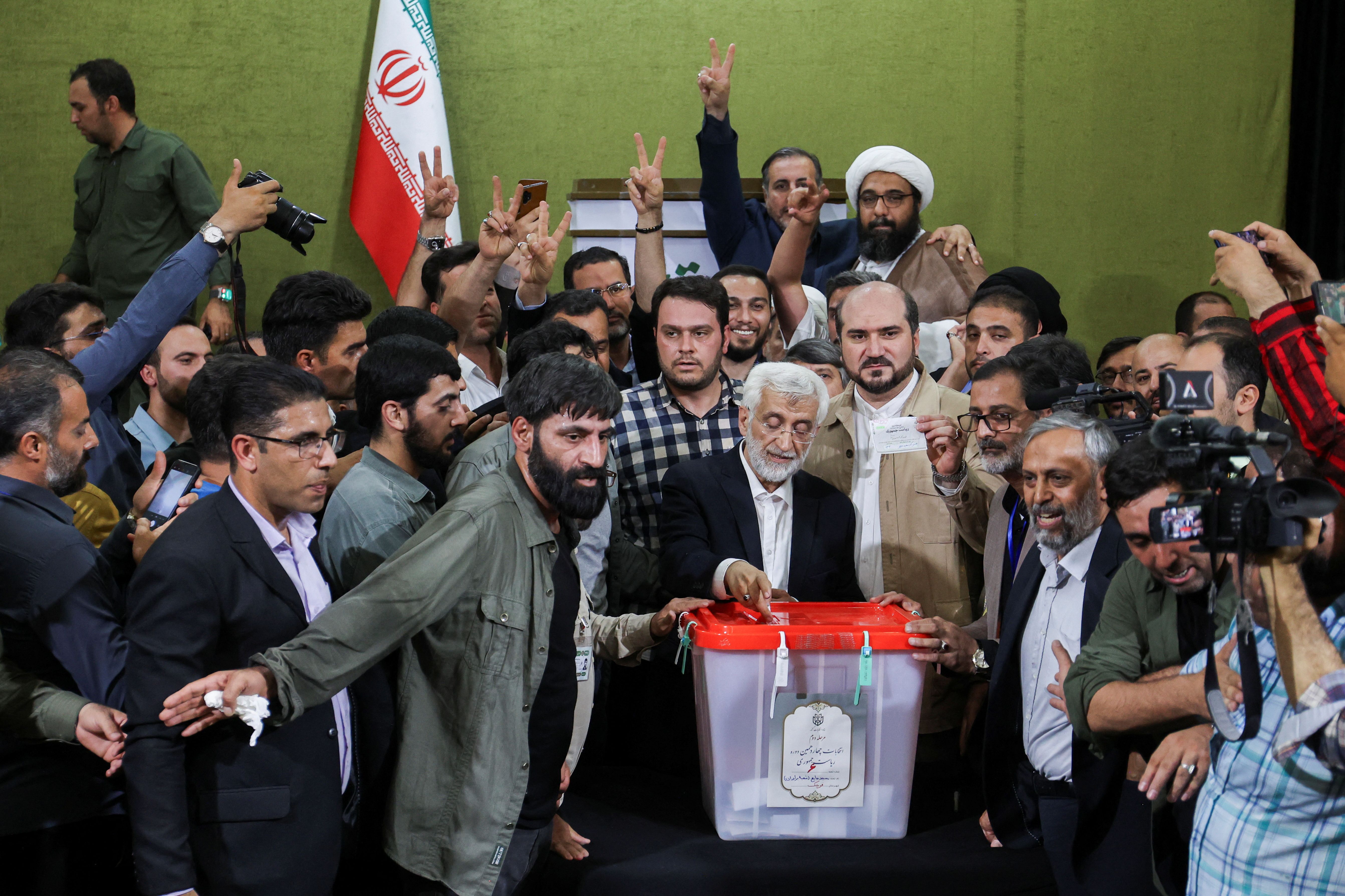 Iranian presidential candidate Saeed Jalili votes during the run-off presidential election between him and Masoud Pezeshkian, in Tehran, Iran, July 5, 2024.