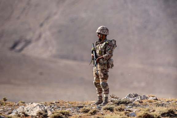 A member of the Islamic Revolutionary Guard Corps (IRGC) during a ground forces military drill in the Aras area near the border with Armenia, East Azarbaijan province, Iran, October 19, 2022