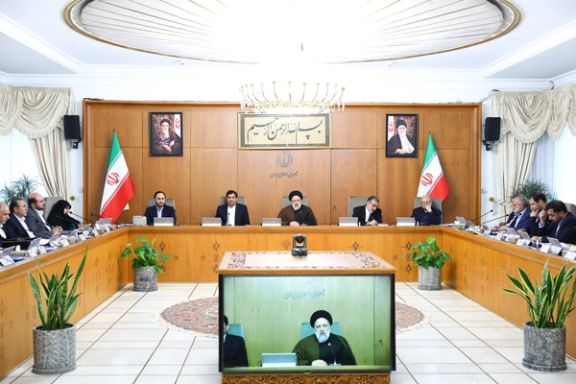 President Ebrahim Raisi (center) during a cabinet meeting on April 9, 2023