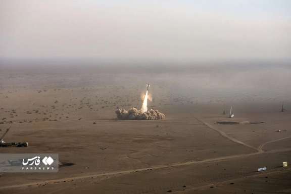 File photo of Iranian missiles being fired in a military drill