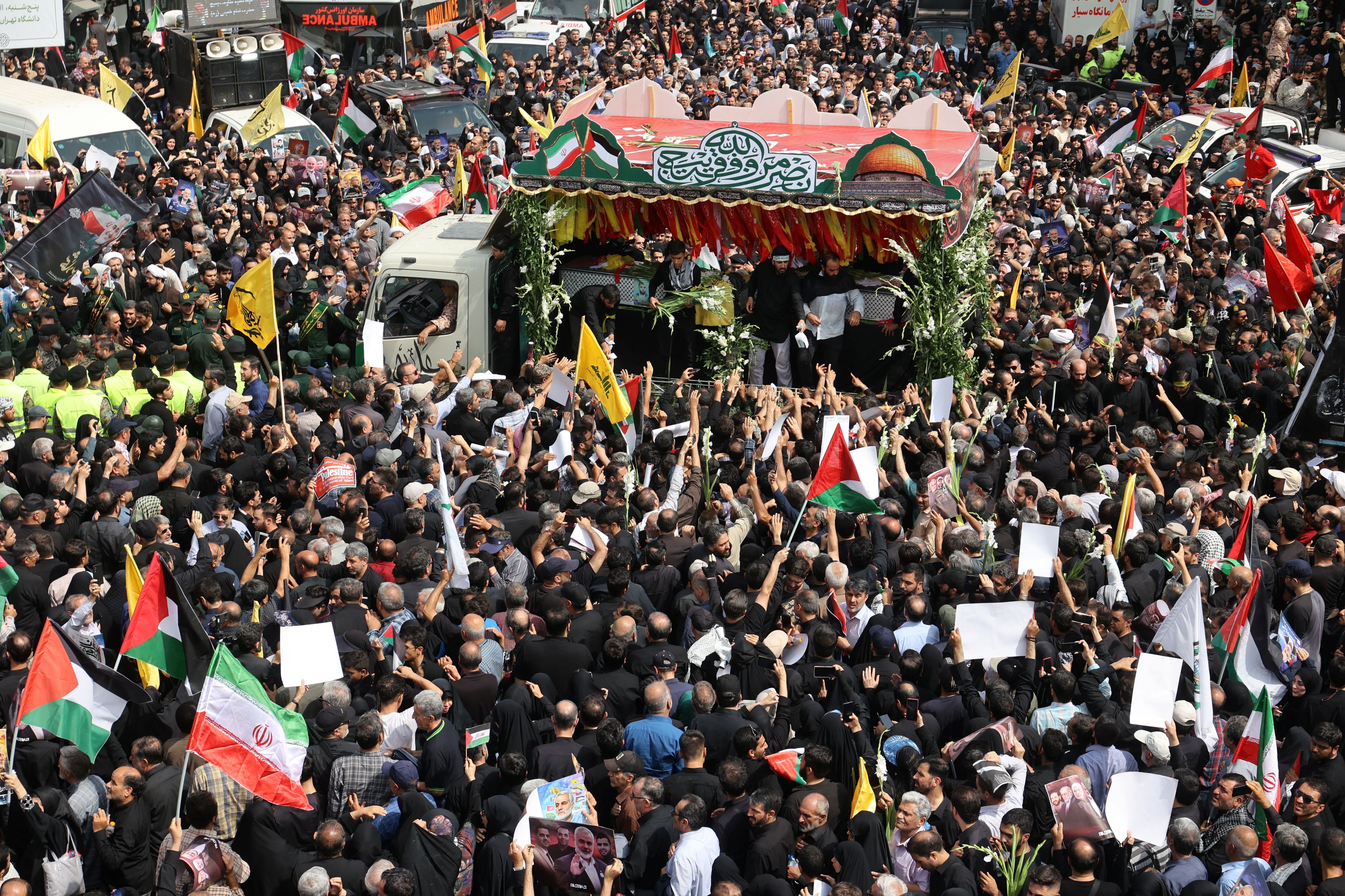 Iranians gather for the funeral procession of assassinated Hamas chief, Ismail Haniyeh and his bodyguard Wasim Abu Shaaban, in Tehran, Iran, August 1, 2024. 