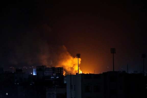 Smoke rises from the site of a Saudi-led air strikes in Sanaa. November 30, 2021