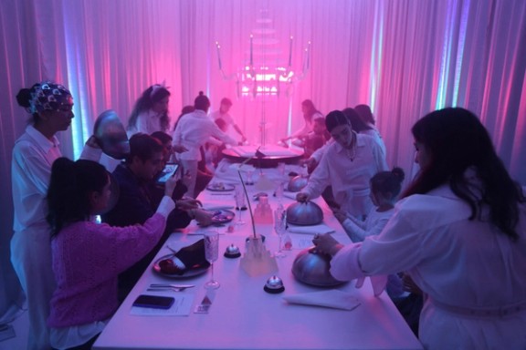 Iranian women visit the Tehran Design Week event in a gallery in Tehran, Iran, November 16, 2025.