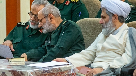 The head of the Revolutionary Guard's intelligence organization, Mohammad Kazemi (center) and his predecessor Hossein Taeb (right)