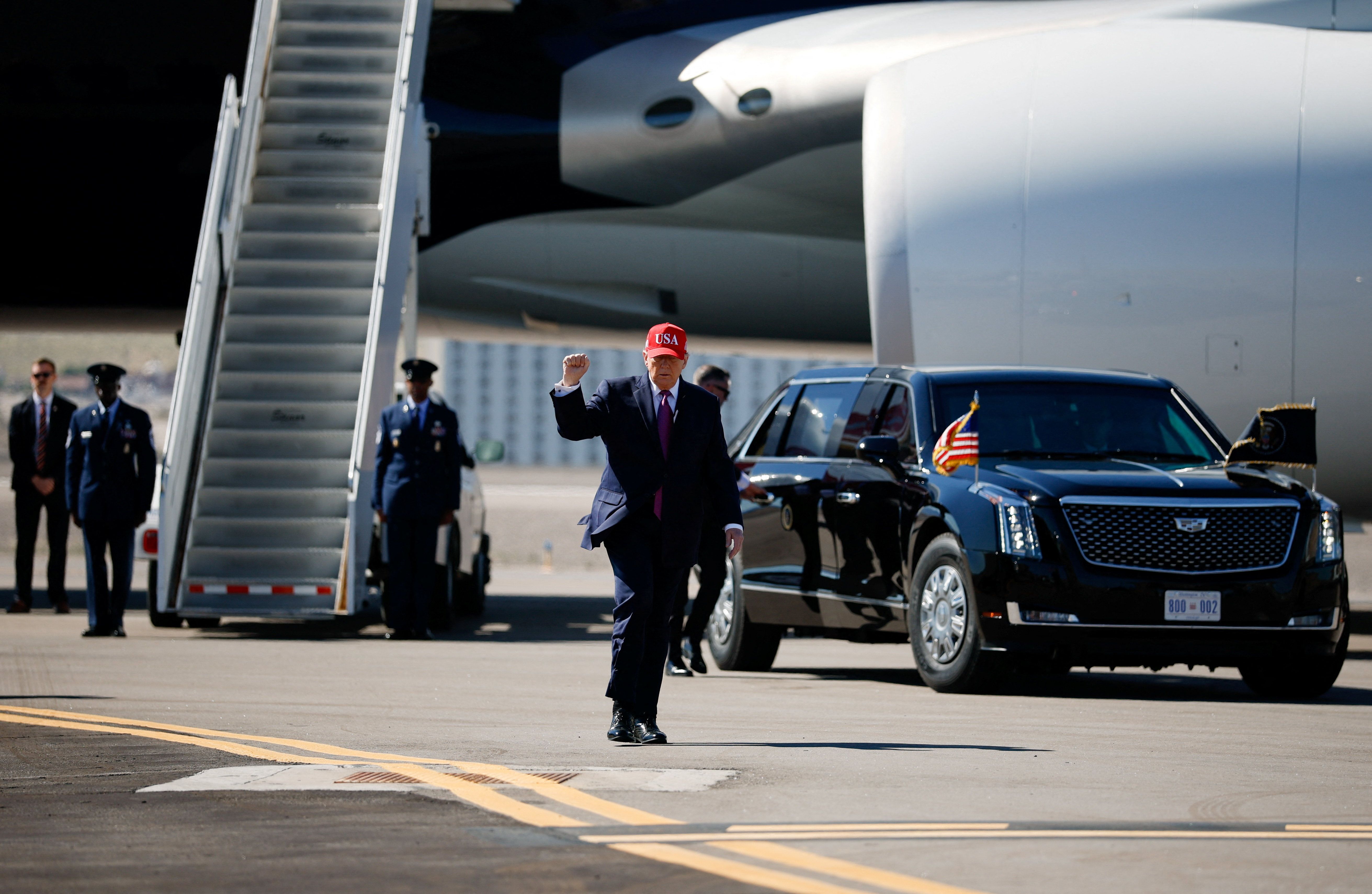 President Donald Trump walks as he arrives for a campaign rally at Bullhead International Airport in Bullhead City, Arizona, October 14, 2026. 