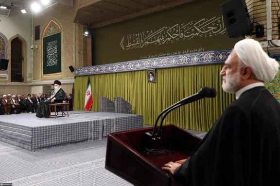 Iran's Chief Justice Gholamreza Mohseni-Ejei (right) speaking during a meeting with Iran's ruler Ali Khamenei