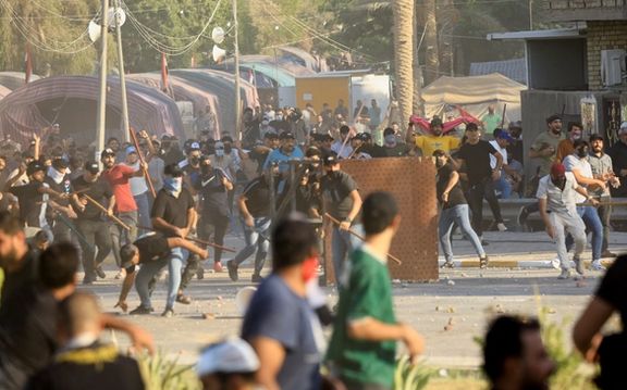 Iraqi Army Declares Curfew After Sadrists Attack Government Buildings