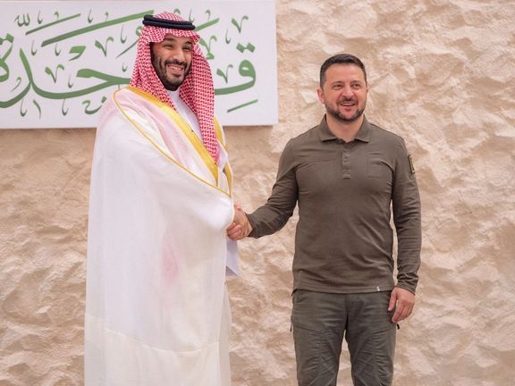 Saudi Crown Prince Mohammed bin Salman shakes hands with Ukrainian President Volodymyr Zelenskiy, ahead of the Arab League summit, in Jeddah, Saudi Arabia, May 19, 2023.
