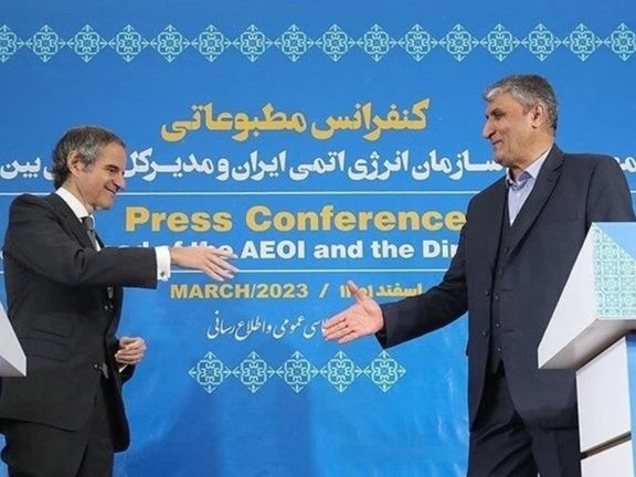 IAEA's Rafael Grossi (left) and Iran's nuclear chief Mohammad Eslami in Tehran on March 4, 2023