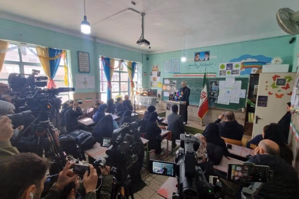 Iran holds press conference at school as concerns grow over use of civilian sites