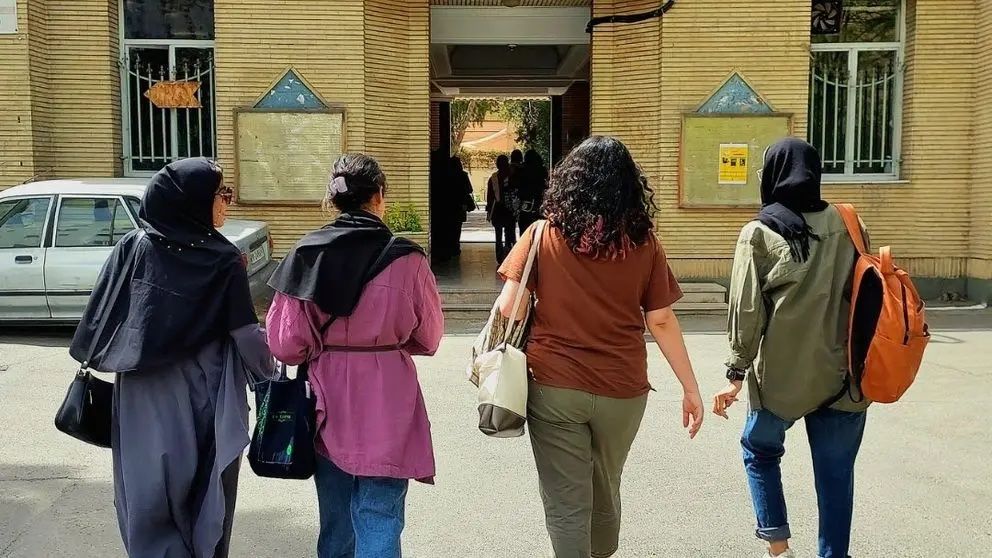 Unveiled students entering Al-Zahra University in Iran. Undated