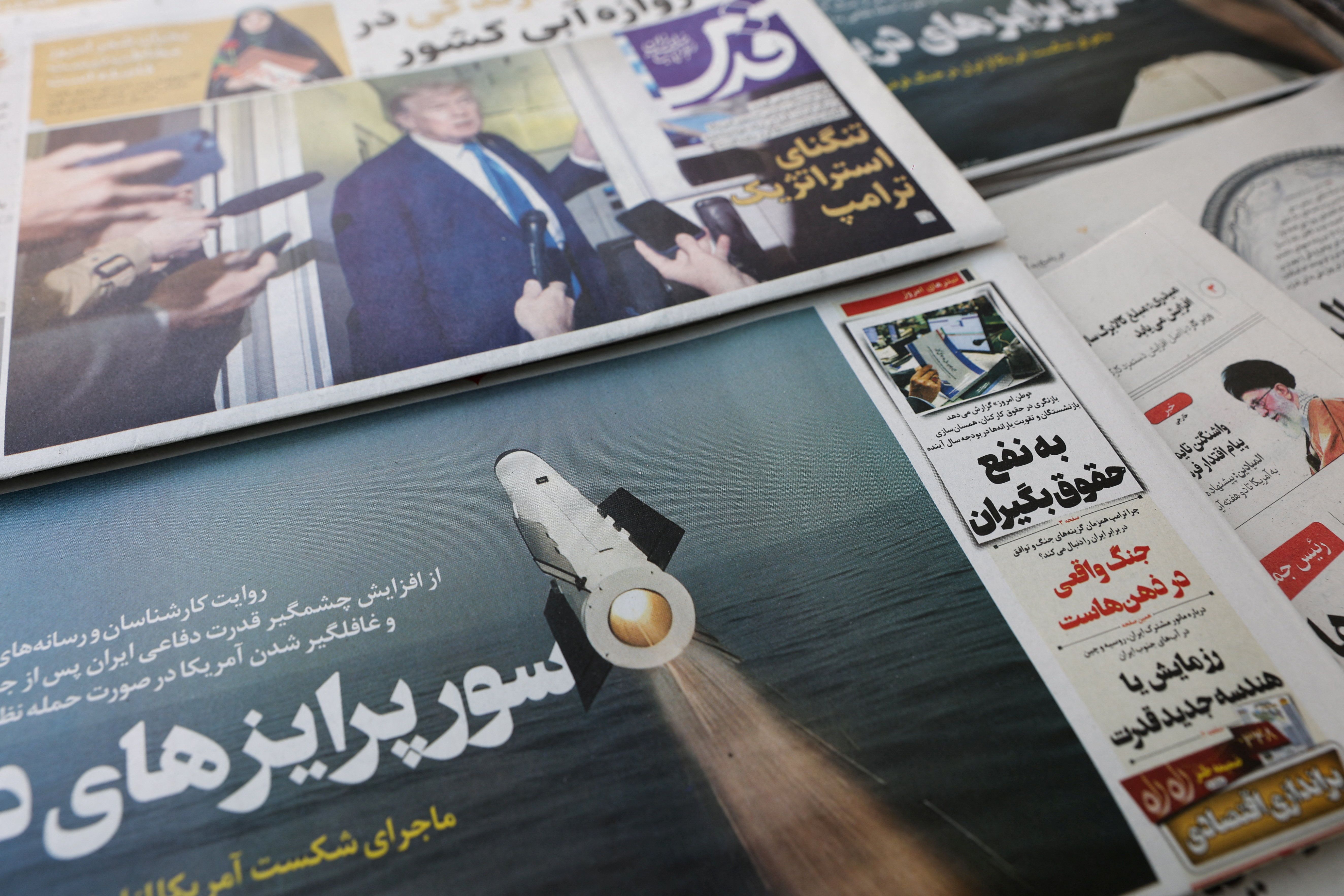 An Iranian newspaper with a cover photo of an Iranian missile, in Tehran, Iran, February 19, 2026. 