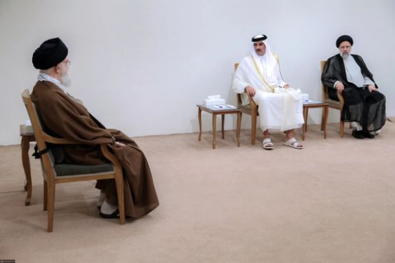 Iran’s Supreme Leader Ali Khamenei (left) during a meeting with Qatari Emir Sheikh Tamim bin Hamad Al-Thani in Tehran on May 12, 2022