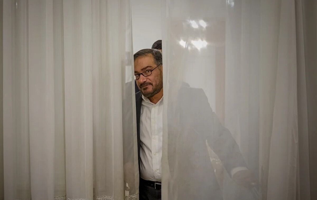 Iranian ex-security chief Ali Shamkhani is pictured between curtains in this file photo.