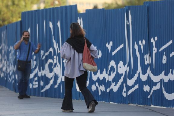 An Iranian woman without mandatory hijab in Tehran