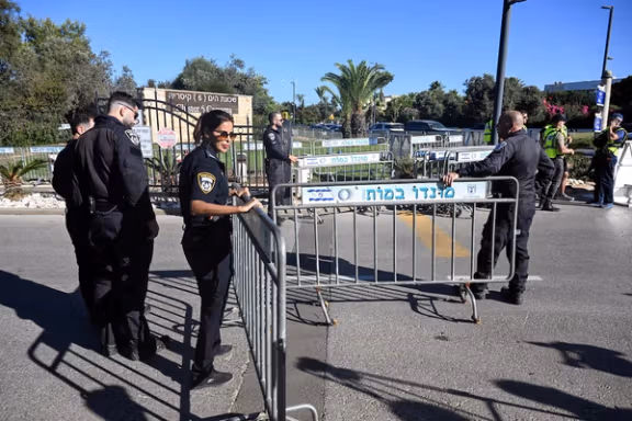 Israeli police set a roadblock on a street in Caesarea, following a drone attack from Lebanon towards Israel amid ongoing hostilities between Hezbollah and Israel October 19, 2024.