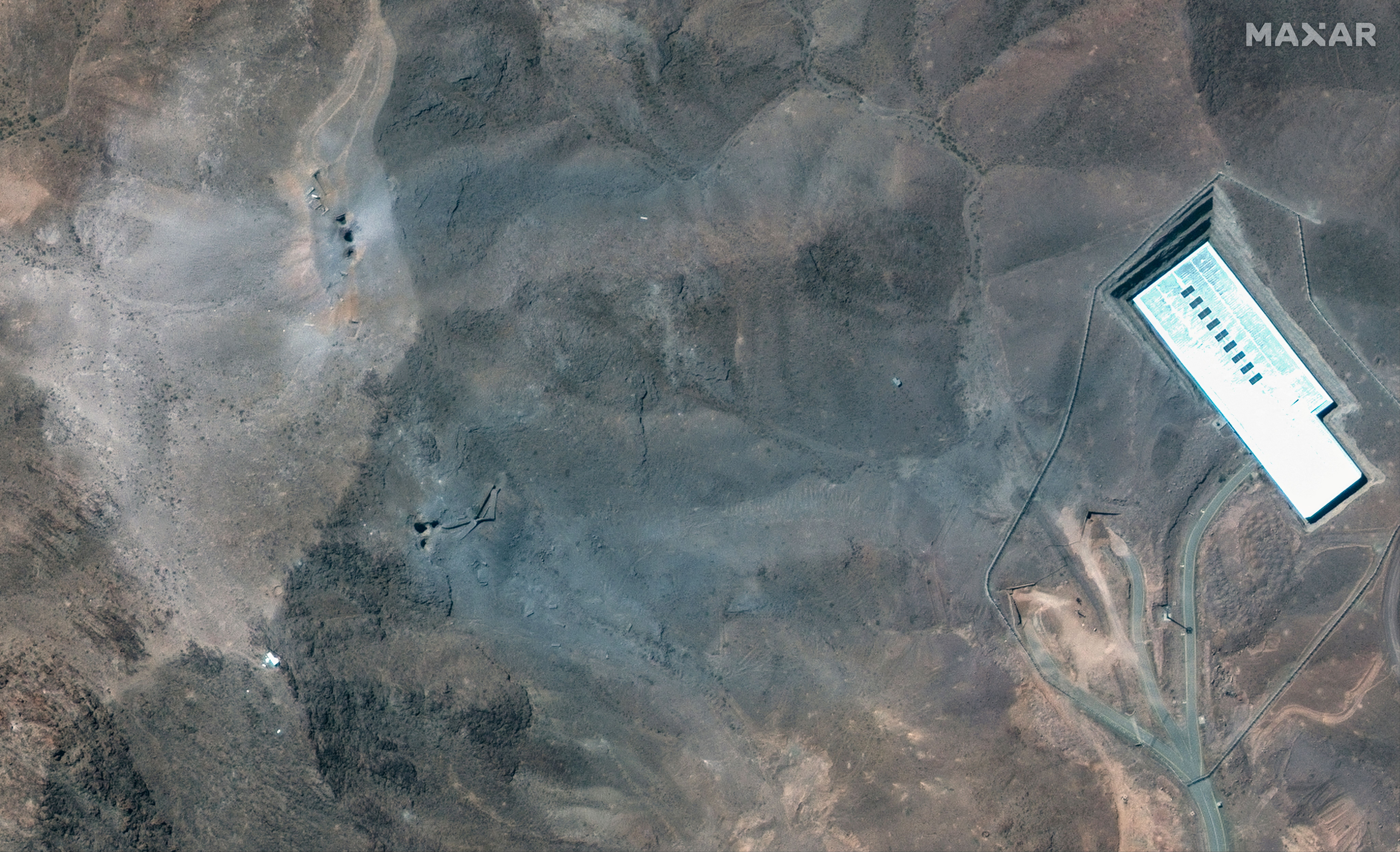 A closer satellite view shows the ridge at Fordow underground complex, after the US struck the underground nuclear facility, near Qom, Iran June 22, 2025. 