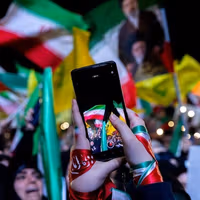 Iran's postwar rallies become flashpoint in diplomacy debate