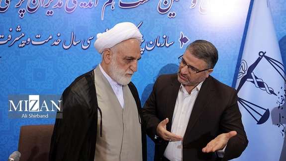 Iran's Chief Justice Gholamreza Mohseni-Ejei (left) during an event on November 22, 2023