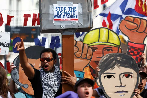 Protesters demonstrate outside a NATO meeting in the Hague, Netherlands.