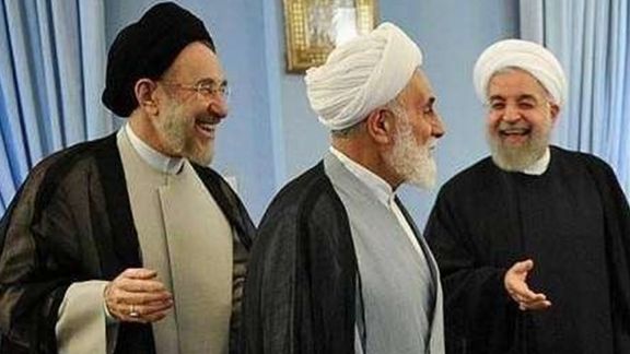 Former Iranian presidents Mohammad Khatami (L) and Hassan Rouhani (R)
