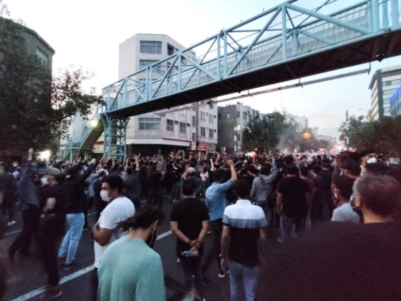 People during a protest over the death of Mahsa Amini in Tehran, September 21, 2022