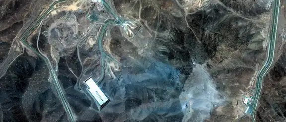 A satellite view shows an overview of Fordow underground complex, after the U.S. struck the underground nuclear facility, near Qom, Iran June 22, 2025. MAXAR TECHNOLOGIES/Handout via REUTERS/File Photo