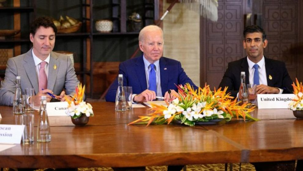 Canada PM Justin Trudeau (left), US President Joe Biden (center) and British PM Rishi Sunak  