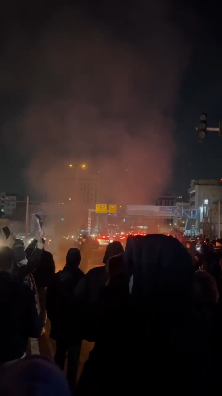 Protesters gather in Tehran’s Punak neighborhood on Sunday, January 11, 2026.
