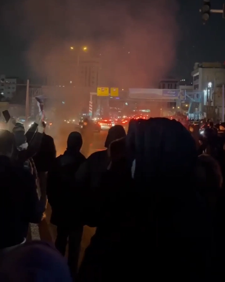 Protesters gather in Tehran’s Punak neighborhood on Sunday, January 11, 2026.