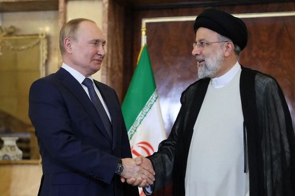 Russian President Vladimir Putin shakes hands with Iranian President Ebrahim Raisi during a meeting in Tehran, Iran July 19, 2022.