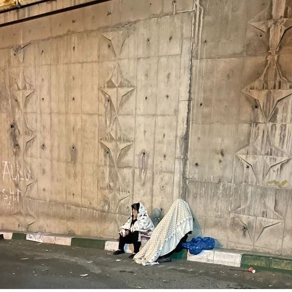 Hossein Ronaghi’s parents outside Evin prison