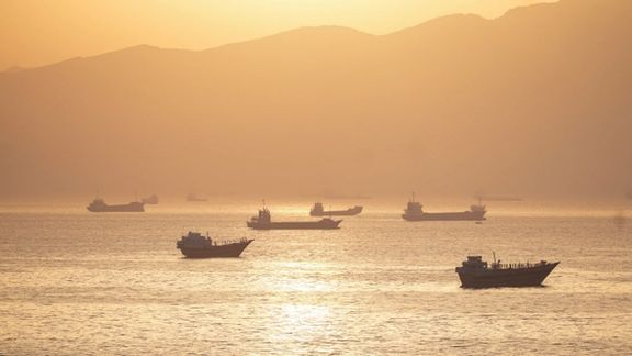A view of ships near the Strait of Hormuz at sunset, file photo, undated