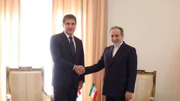 File photo from May 2025 shows Iran's Foreign Minister Abbas Araghchi (right) shaking hands with Kurdistan President Barzani.