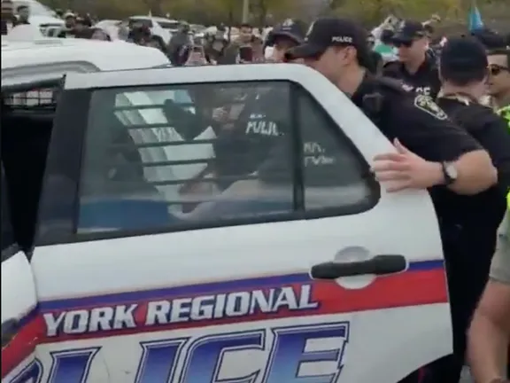Man charged after allegedly driving into Iran protest crowd in Canada