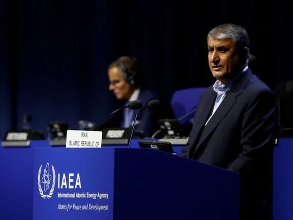 The head of Iran's Atomic Energy Organization, Mohammad Eslami (right)and International Atomic Energy Agency Director General Rafael Grossi attend the opening of the IAEA General Conference at their headquarters in Vienna, Austria, September 26, 2022.