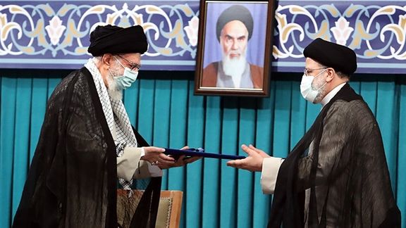 Raisi receiving his presidential seal of approval from Khamenei n August 3, 2021.