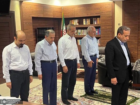 Abbas Araghchi (front) saying prayers with Mohammad Javad Zarif (first from right) and Masoud Pezeshkian (second from right)