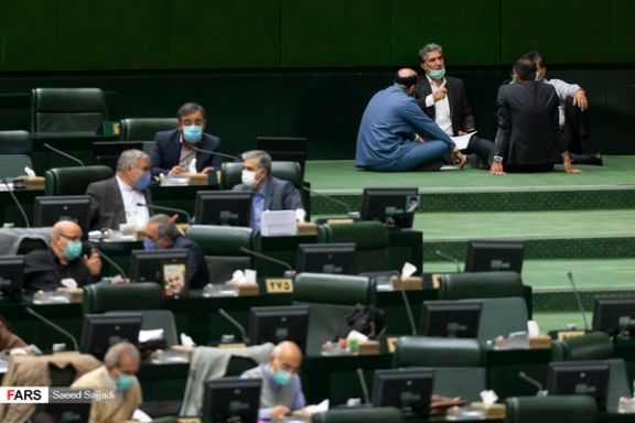 A few lawmakers chatting on the sidelines of