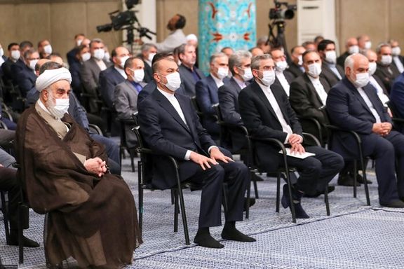 Iran's foreign minister Hossein Amir-Abdollahian and nuclear negotiator Ali Bagheri-Kani listening to Khamenei on May 20, 2023