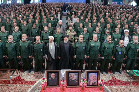 Iranian President Ebrahim Raisi (center) among senior Revolutionary Guards commanders during an event where IRGC Navy released a video of intercepting US Navy ships