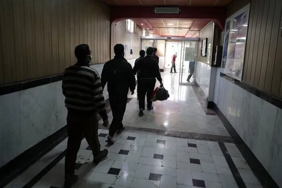 Men walk inside a prison in Iran in this file photo.