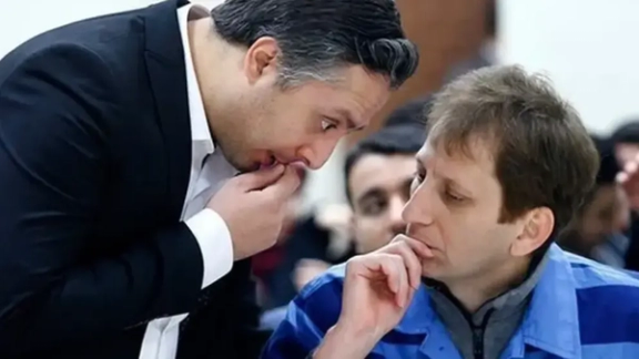 Iranian Oil tycoon Babak Zanjani and his attorney Rasoul Koohpayehzadeh (L)
