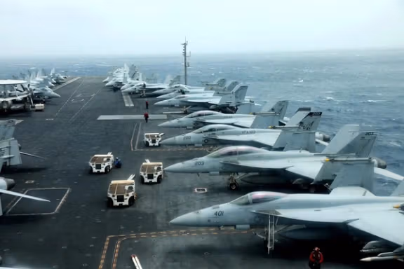 F/A-18F aircrafts are seen on the deck of USS Abraham Lincoln in the Gulf of Oman near the Strait of Hormuz in this file photo taken July 15, 2019.
