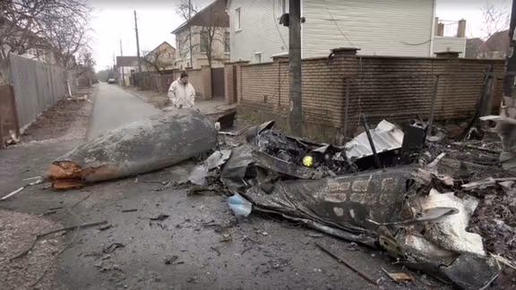 The wreckage of an unidentified plane in a residential area in Kiev. February 25, 2022