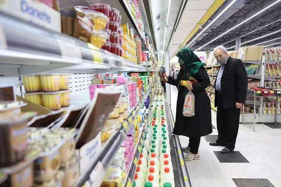 An Iranians couple at a shopping center in Tehran