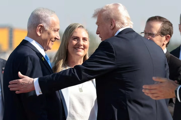 Israeli Prime Minister Benjamin Netanyahu welcomes US President Donald Trump at Ben Gurion International Airport, amid a U.S.-brokered prisoner-hostage swap and ceasefire deal between Israel and Hamas, in Lod, Israel, October 13, 2025.